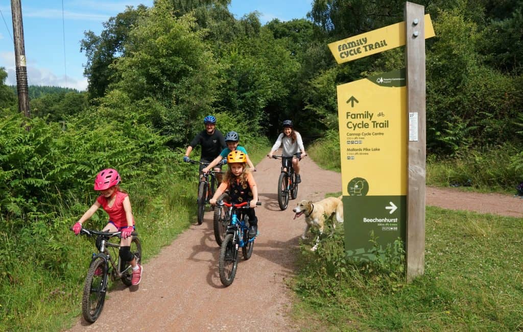 Family cycling together on the family cycle trail