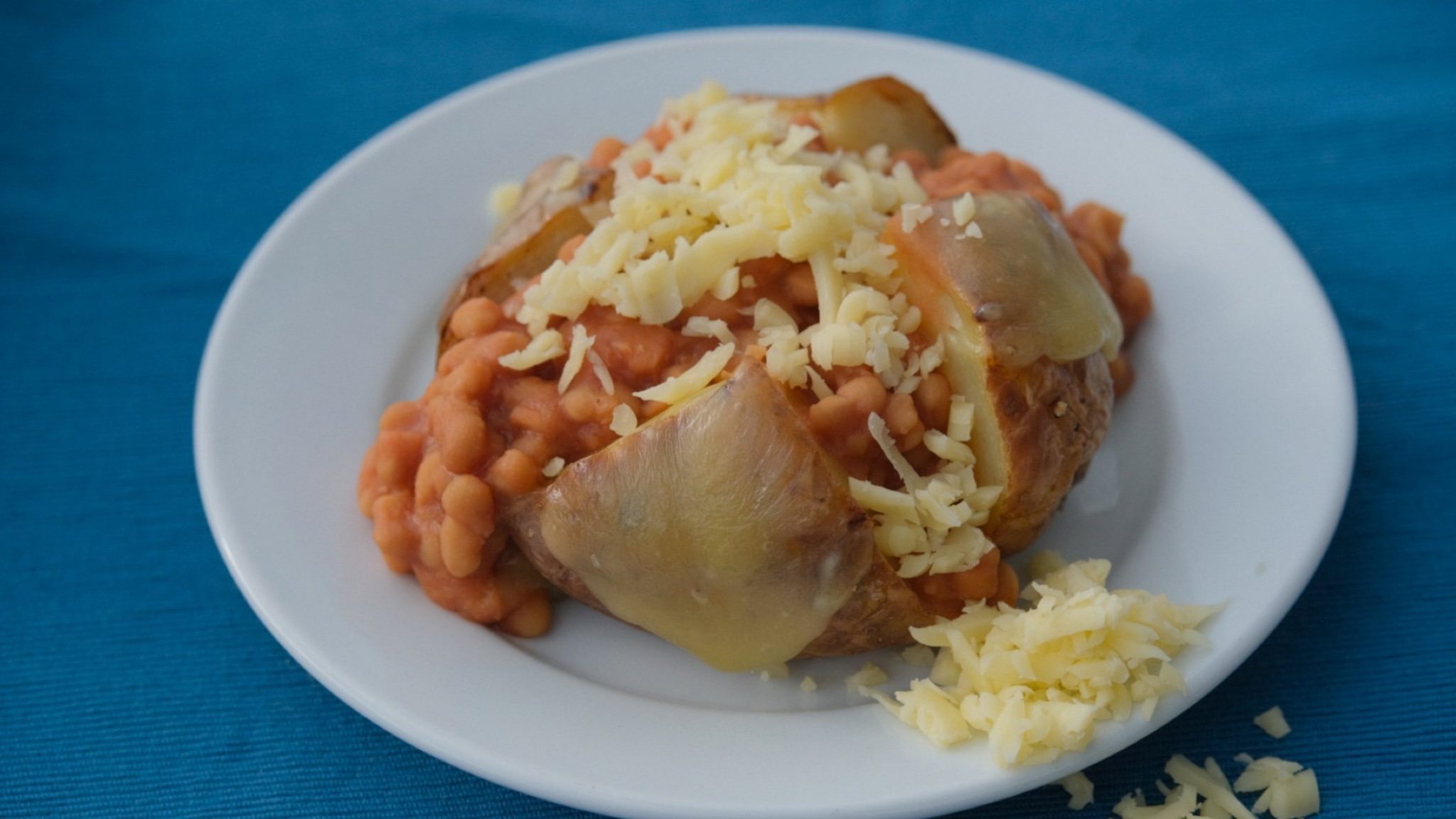 Photo of jacket potato with baked beans and cheese, new autumn menu at Pedalabikeaway Cafe