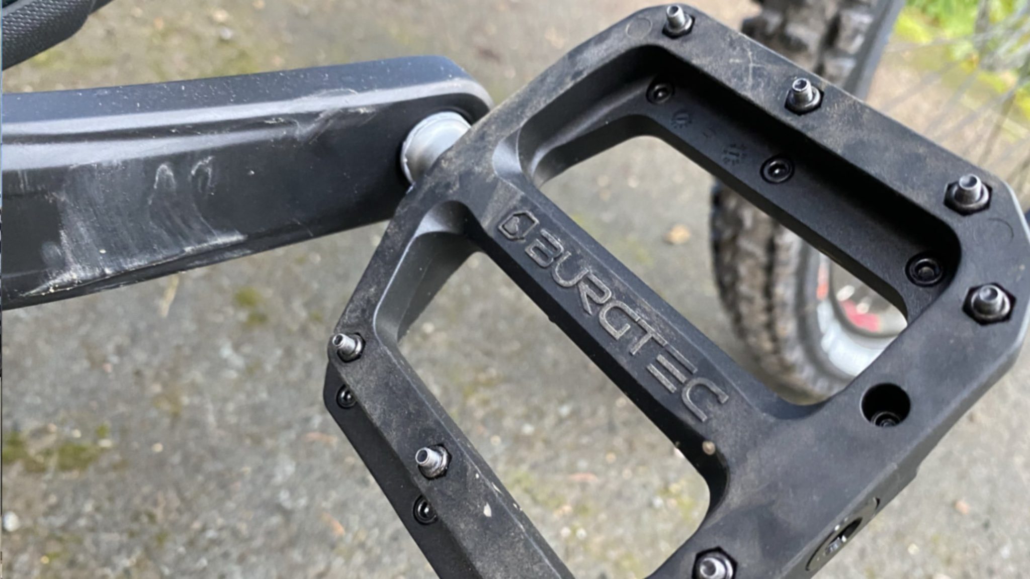 Photograph of Burgtec flat mountain bike pedals on the Whyte T 160 hire mountain bike at Pedalabikeaway
