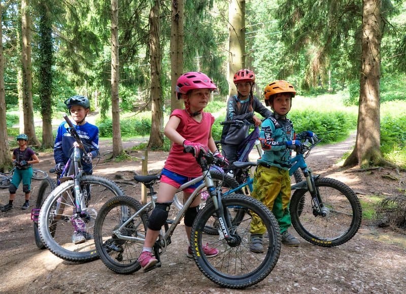 Kids having MTB coaching